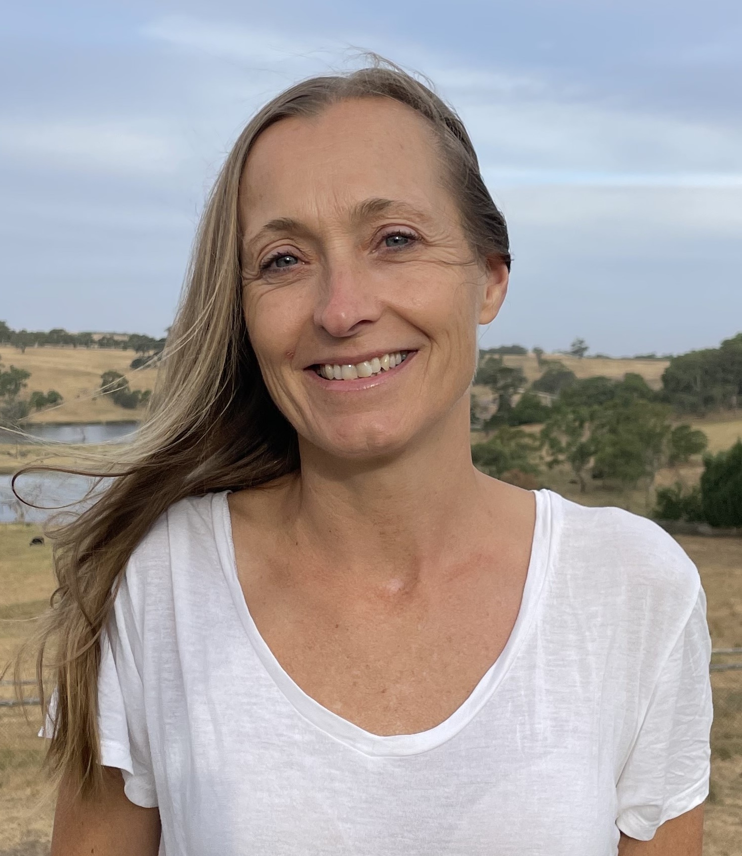 Kari meditating peacefully in nature